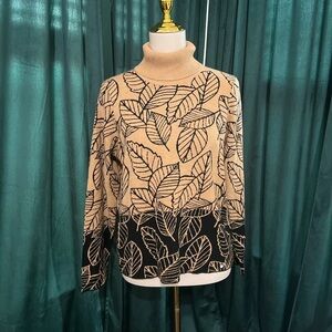 Goléhaug Beige and Black Leaf Turtleneck Sweater